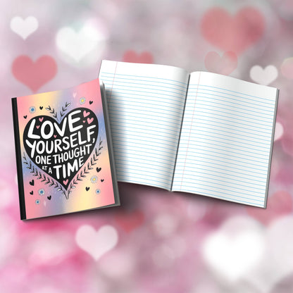 Paperback journal "Love Yourself One Thought At A Time" with uplifting cover, designed for mindfulness, self-care, and personal growth.