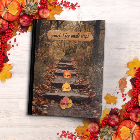 Grateful For Small Steps paperback composition notebook for gratitude journaling and reflection.