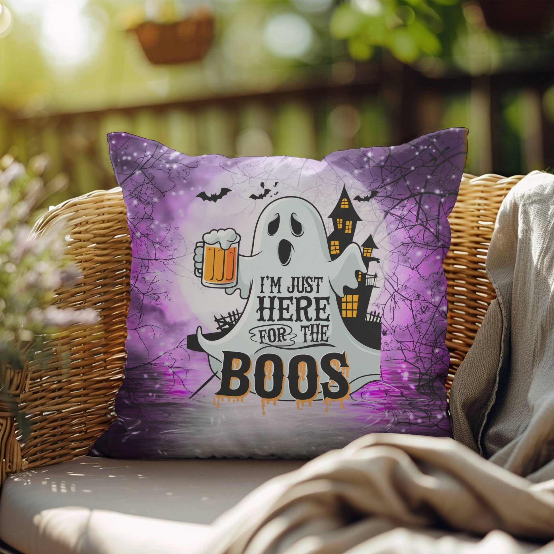 Ghost-themed indoor/outdoor Halloween pillow with “I’m Just Here For The Boos” for fun décor