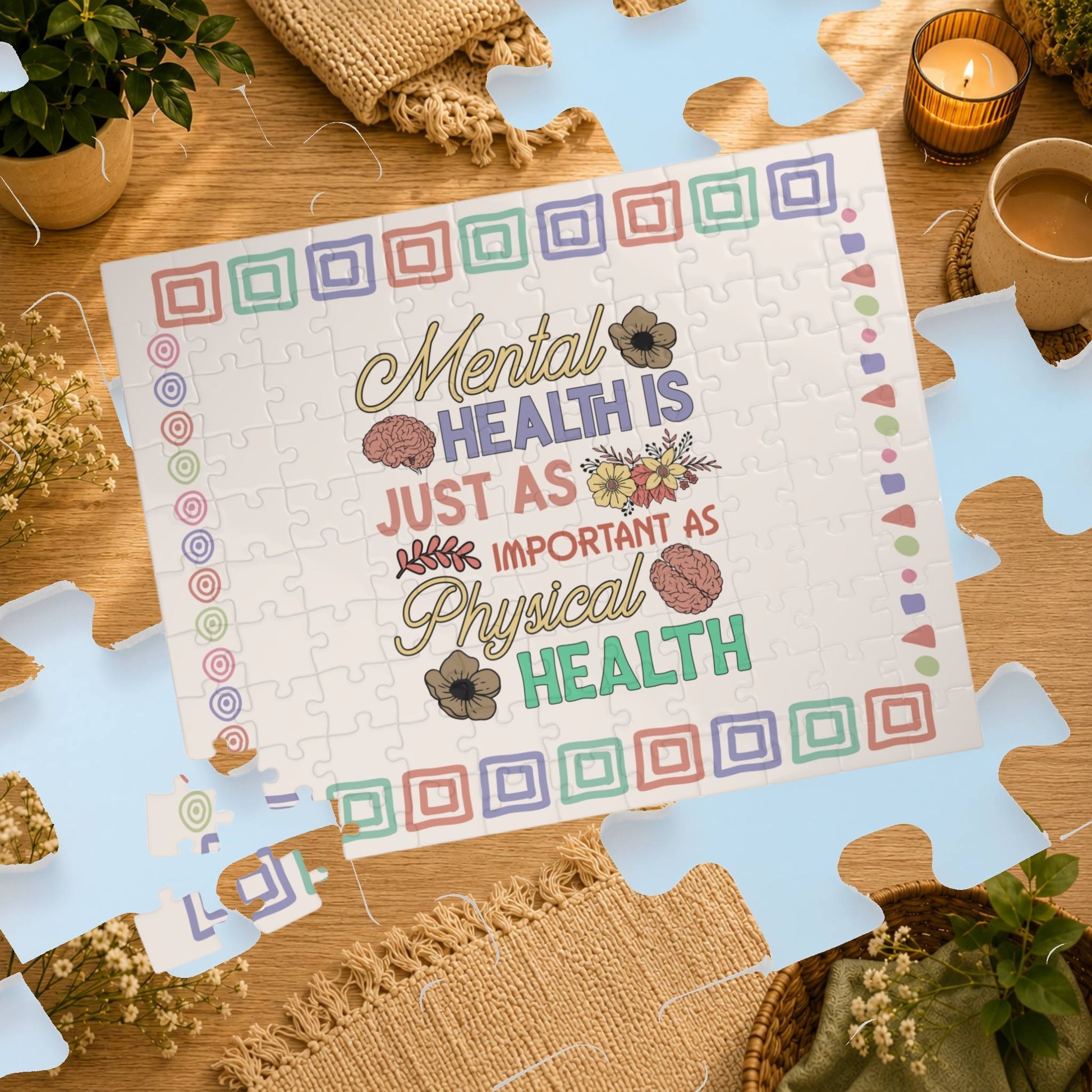 Jigsaw puzzle with motivational quote on a wooden table with decorative items.