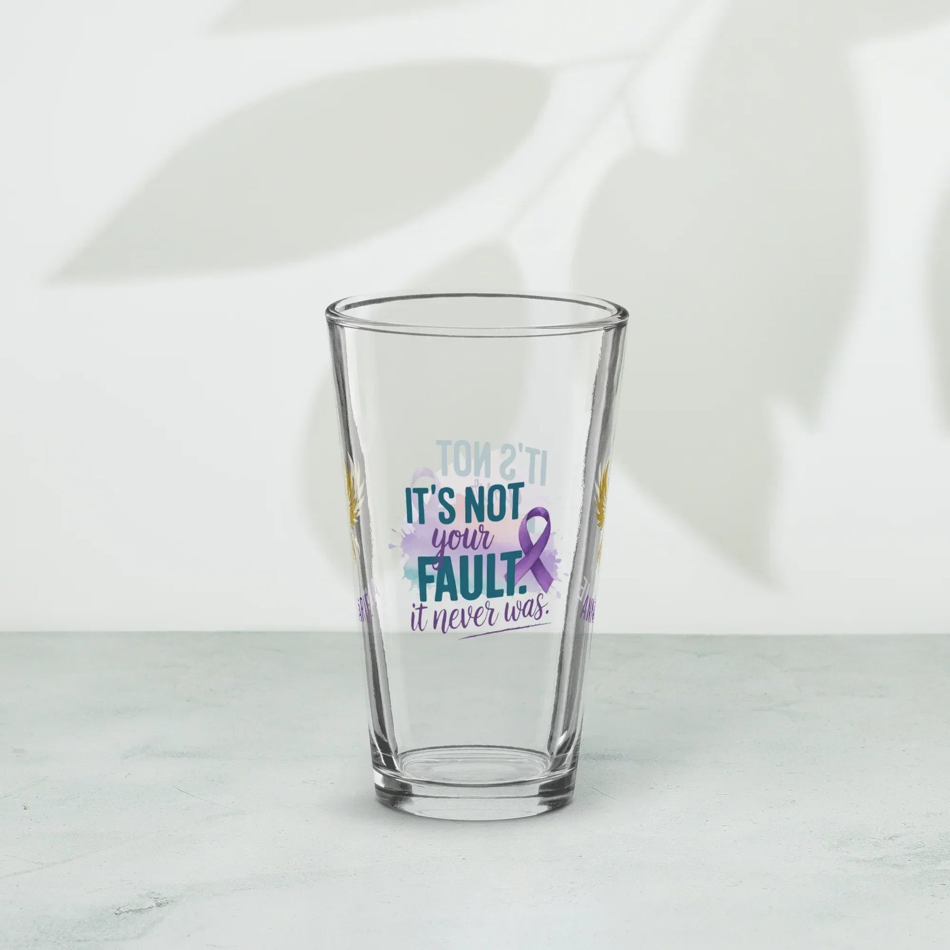 Shop our premium rise reclaim pint glass its not your fault from MySisterIsASurvivor.