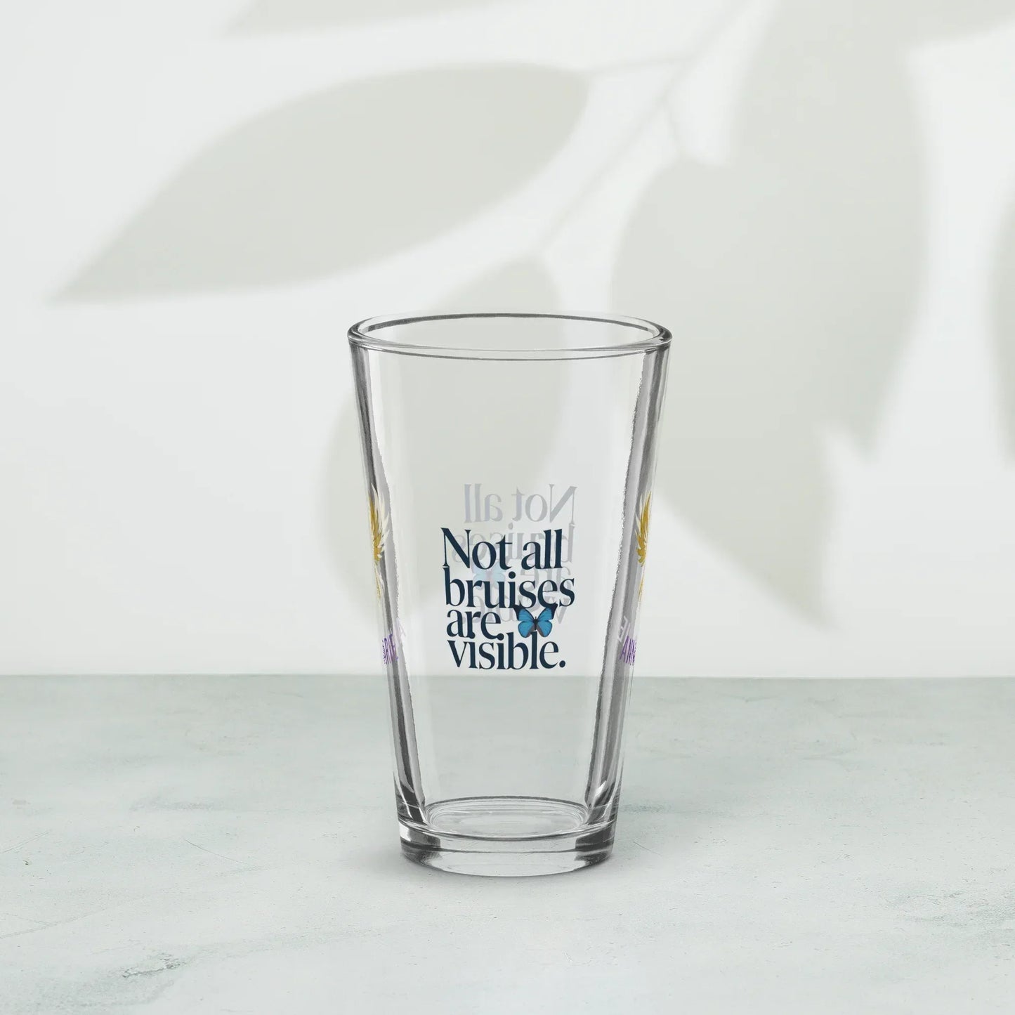 Shop our premium rise reclaim pint glass not all bruises from MySisterIsASurvivor.
