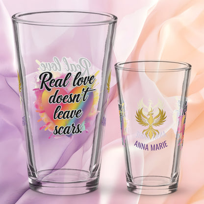 Real Love Doesn’t Leave Scars pint glass, domestic violence advocacy drinkware, survivor empowerment quote