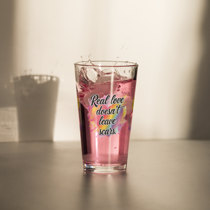 Real Love Doesn’t Leave Scars pint glass, domestic violence advocacy drinkware, survivor empowerment quote