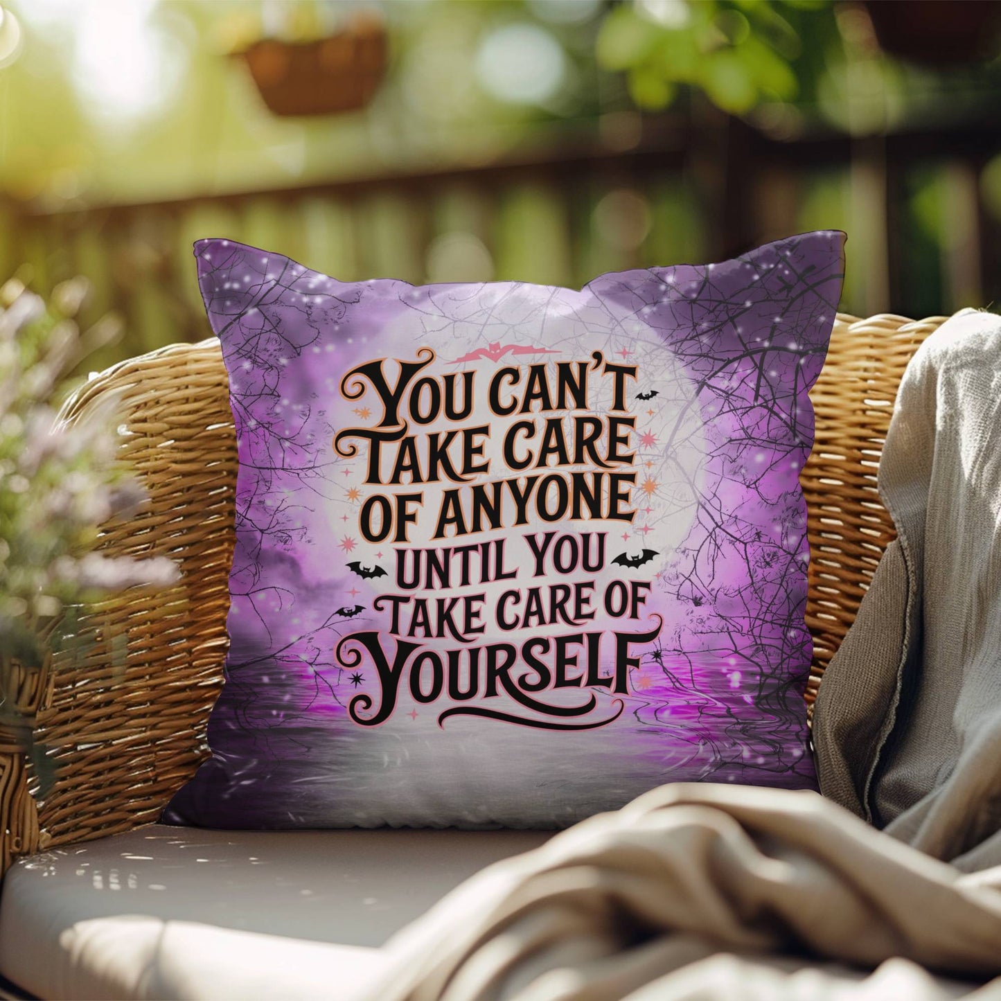 Indoor/outdoor mental health pillow with “You Can’t Take Care” supportive message