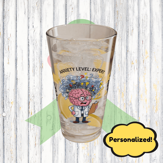 "Anxiety Level: Expert" personalized pint glass with attitude, offering daily humor and self-care.