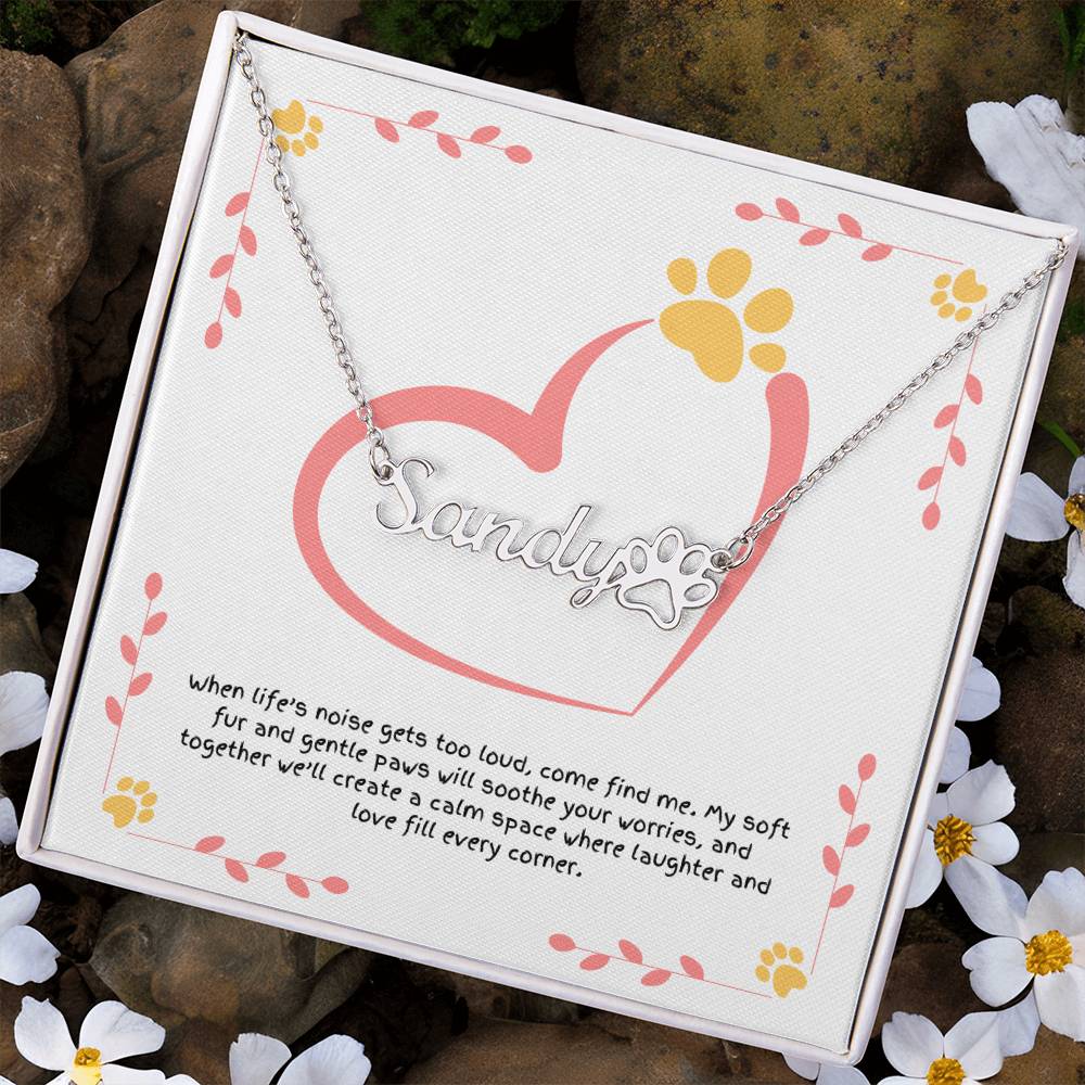 Paw print name necklace for pet owners, symbolizing guidance, emotional support, and the unshakable bond between dog and human.