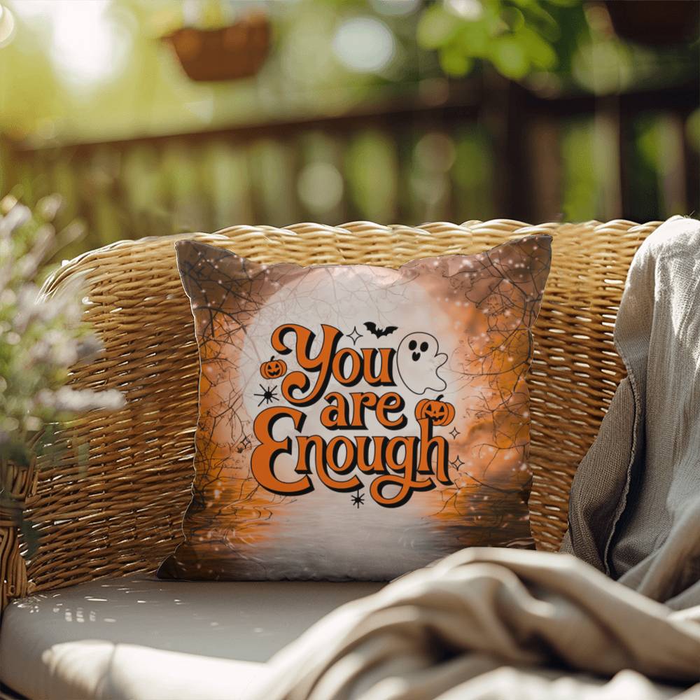 Indoor/outdoor pillow with “You Are Enough” promoting self-love and mental health