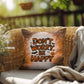 Skeleton-themed Halloween indoor/outdoor pillow with “Don’t Worry Be Happy” for mental health encouragement