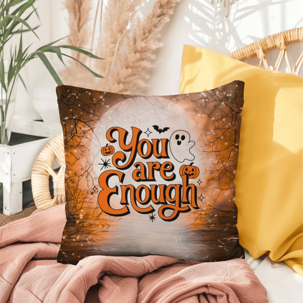 Indoor/outdoor pillow with “You Are Enough” promoting self-love and mental health