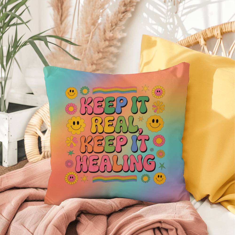 Custom pillow with “Keep It Real, Keep It Healing” in fun vintage font, for authenticity and support in therapy or wellness spaces