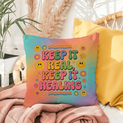 Custom pillow with “Keep It Real, Keep It Healing” in fun vintage font, for authenticity and support in therapy or wellness spaces