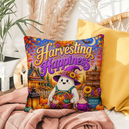 Harvesting Happiness quote with autumn harvest artwork on a Halloween throw pillow promoting gratitude