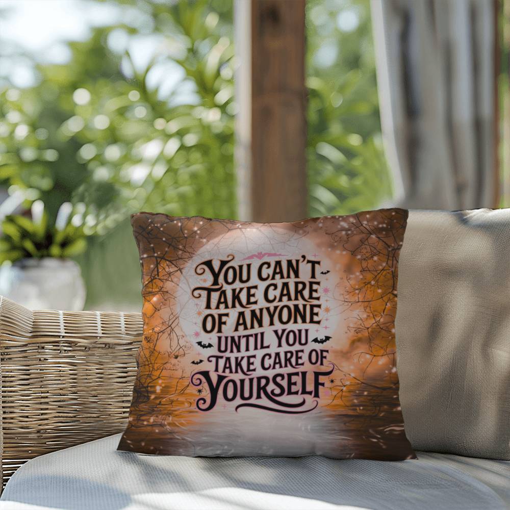 Indoor/outdoor mental health pillow with “You Can’t Take Care” supportive message