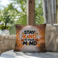Indoor/outdoor throw pillow with “Stay Kind To Your Mind” promoting mental wellness