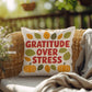 Gratitude Over Stress pillow featuring uplifting Thanksgiving mindfulness message for cozy home décor