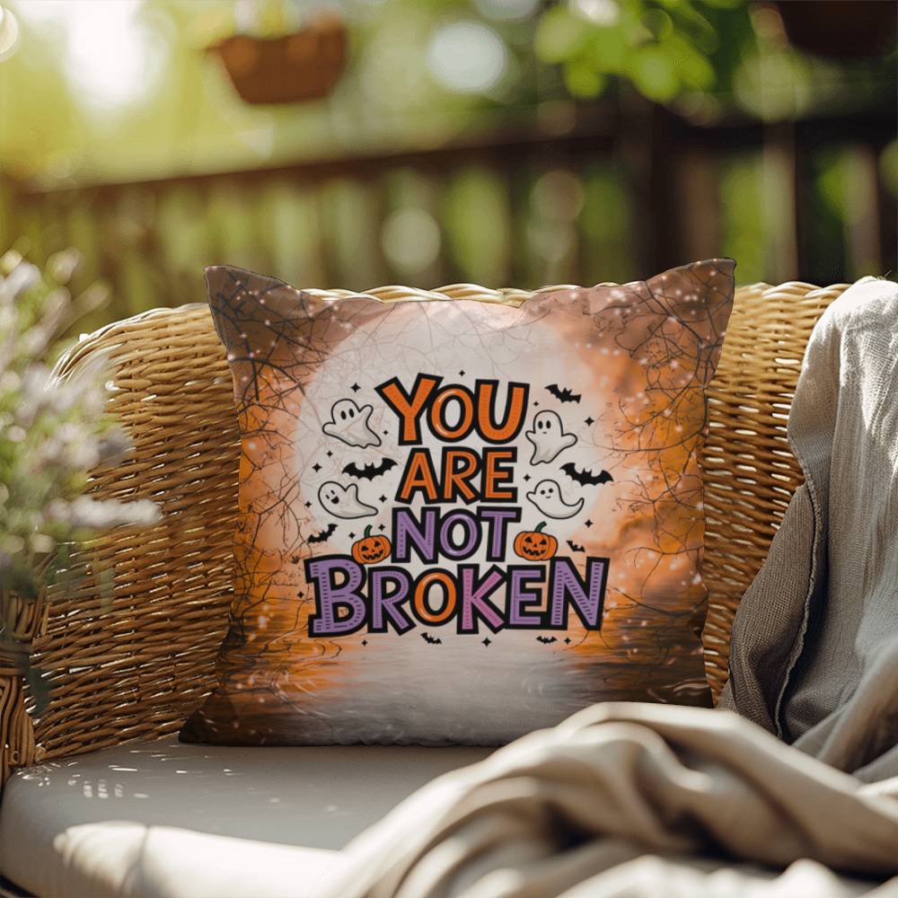 Indoor/outdoor pillow with “You Are Not Broken” for mental health awareness