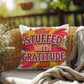 Stuffed With Gratitude throw pillow featuring Thanksgiving quote and warm fall seasonal décor accent