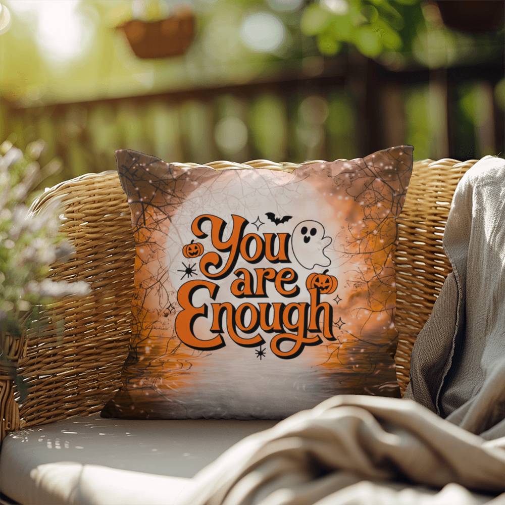 Indoor/outdoor pillow with “You Are Enough” promoting self-love and mental health