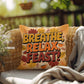 Breathe, Relax, Feast! pillow in fall colors with Thanksgiving mindfulness quote for cozy home spaces