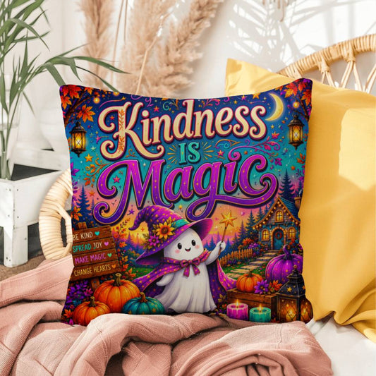 Kindness Is Magic quote with cheerful Halloween artwork on a positive decorative throw pillow