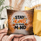 Indoor/outdoor throw pillow with “Stay Kind To Your Mind” promoting mental wellness
