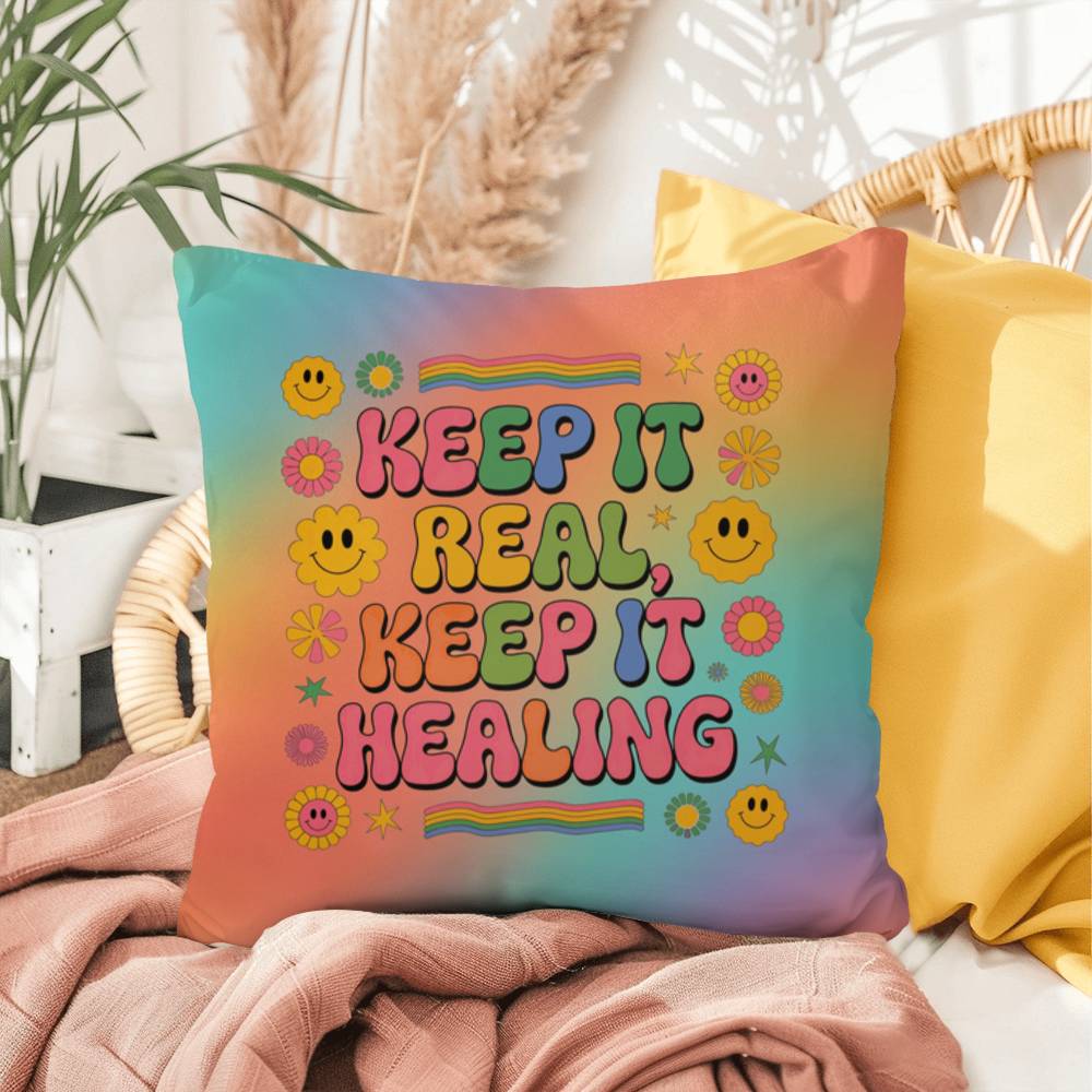 Custom pillow with “Keep It Real, Keep It Healing” in fun vintage font, for authenticity and support in therapy or wellness spaces