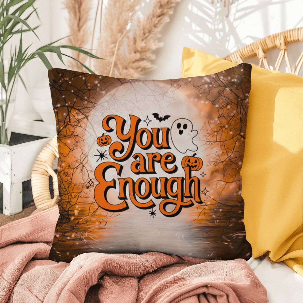 Indoor/outdoor pillow with “You Are Enough” promoting self-love and mental health