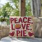 Peace, Love, Pie throw pillow with colorful fall design and mindfulness quote for seasonal comfort