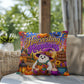 Harvesting Happiness quote with autumn harvest artwork on a Halloween throw pillow promoting gratitude