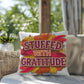 Stuffed With Gratitude throw pillow featuring Thanksgiving quote and warm fall seasonal décor accent