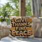 Give Thanks, Find Peace throw pillow with mindful Thanksgiving quote and vibrant autumn décor colors