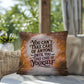 Indoor/outdoor mental health pillow with “You Can’t Take Care” supportive message