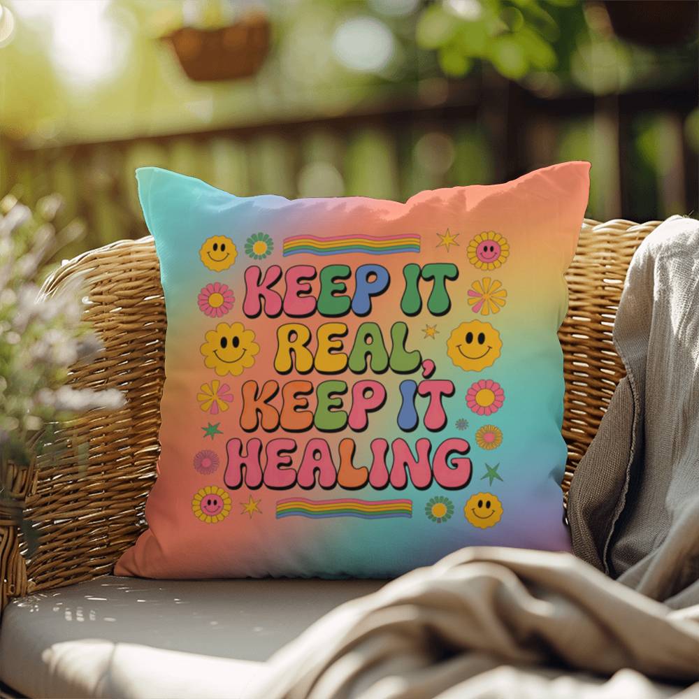 Custom pillow with “Keep It Real, Keep It Healing” in fun vintage font, for authenticity and support in therapy or wellness spaces