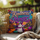 Kindness Is Magic quote with cheerful Halloween artwork on a positive decorative throw pillow