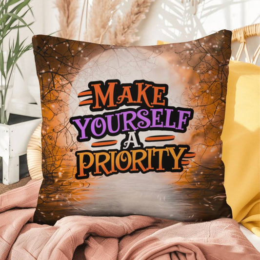 Indoor/outdoor pillow with motivational “Make Yourself A Priority” for self-care