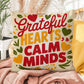 Grateful Hearts, Calm Minds pillow in bright fall tones with Thanksgiving gratitude and mindfulness quote