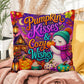 Pumpkin Kisses & Cozy Wishes saying with cute autumn artwork on a Halloween throw pillow