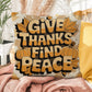 Give Thanks, Find Peace throw pillow with mindful Thanksgiving quote and vibrant autumn décor colors