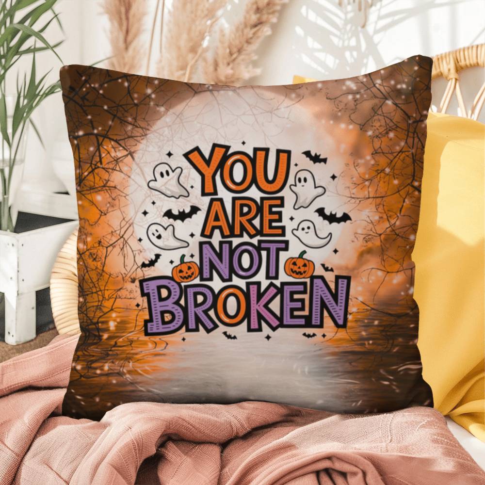 Indoor/outdoor pillow with “You Are Not Broken” for mental health awareness