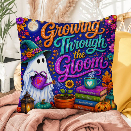 Growing Through The Gloom message on a Halloween throw pillow celebrating resilience and recovery
