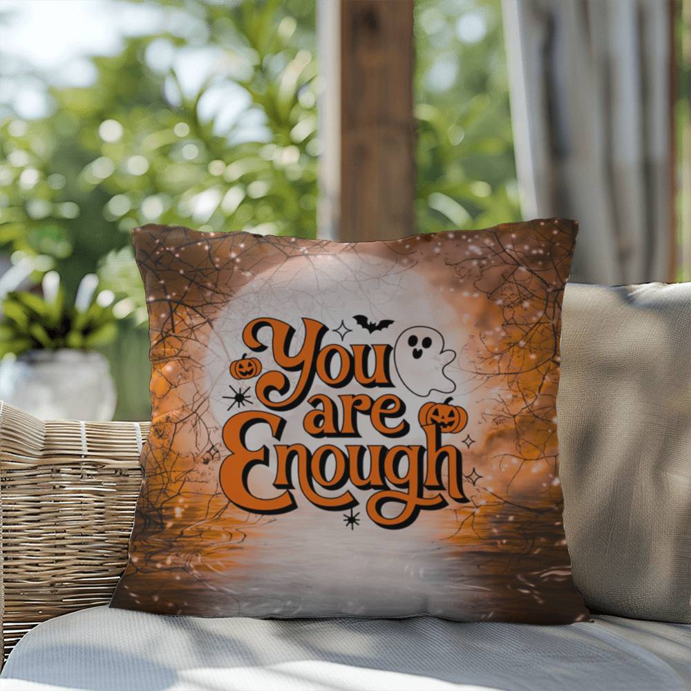 Indoor/outdoor pillow with “You Are Enough” promoting self-love and mental health