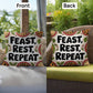 Feast, Rest, Repeat pillow featuring mindfulness message with cozy Thanksgiving and fall décor vibes