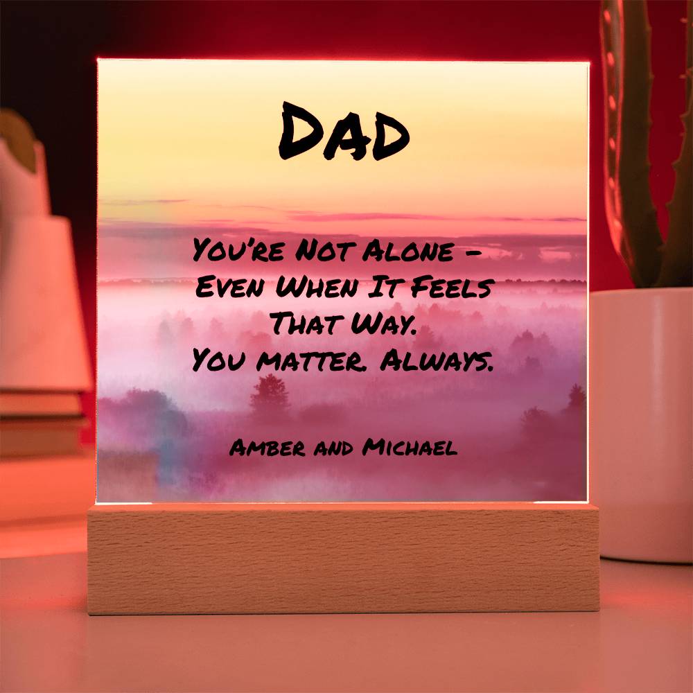 Encouraging message plaque reading “You’re Not Alone,” mental health support gift for fathers.