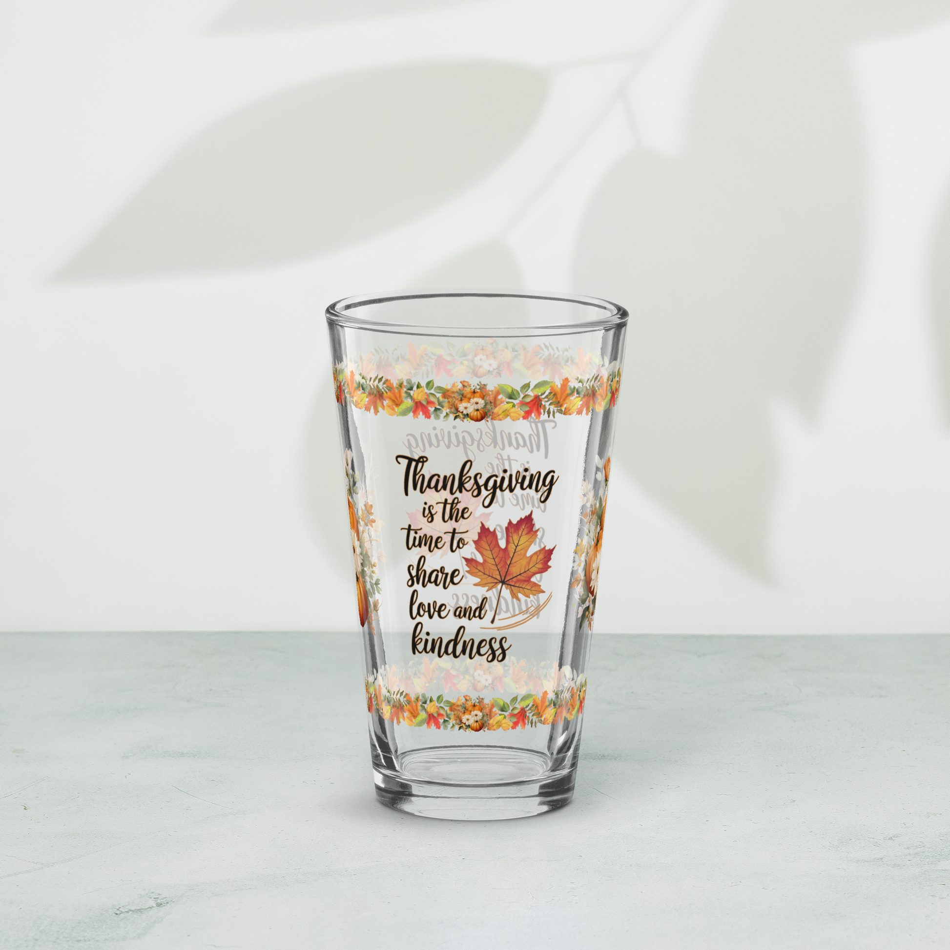 Thanksgiving pint glass with “Share Love And Kindness” holiday quote