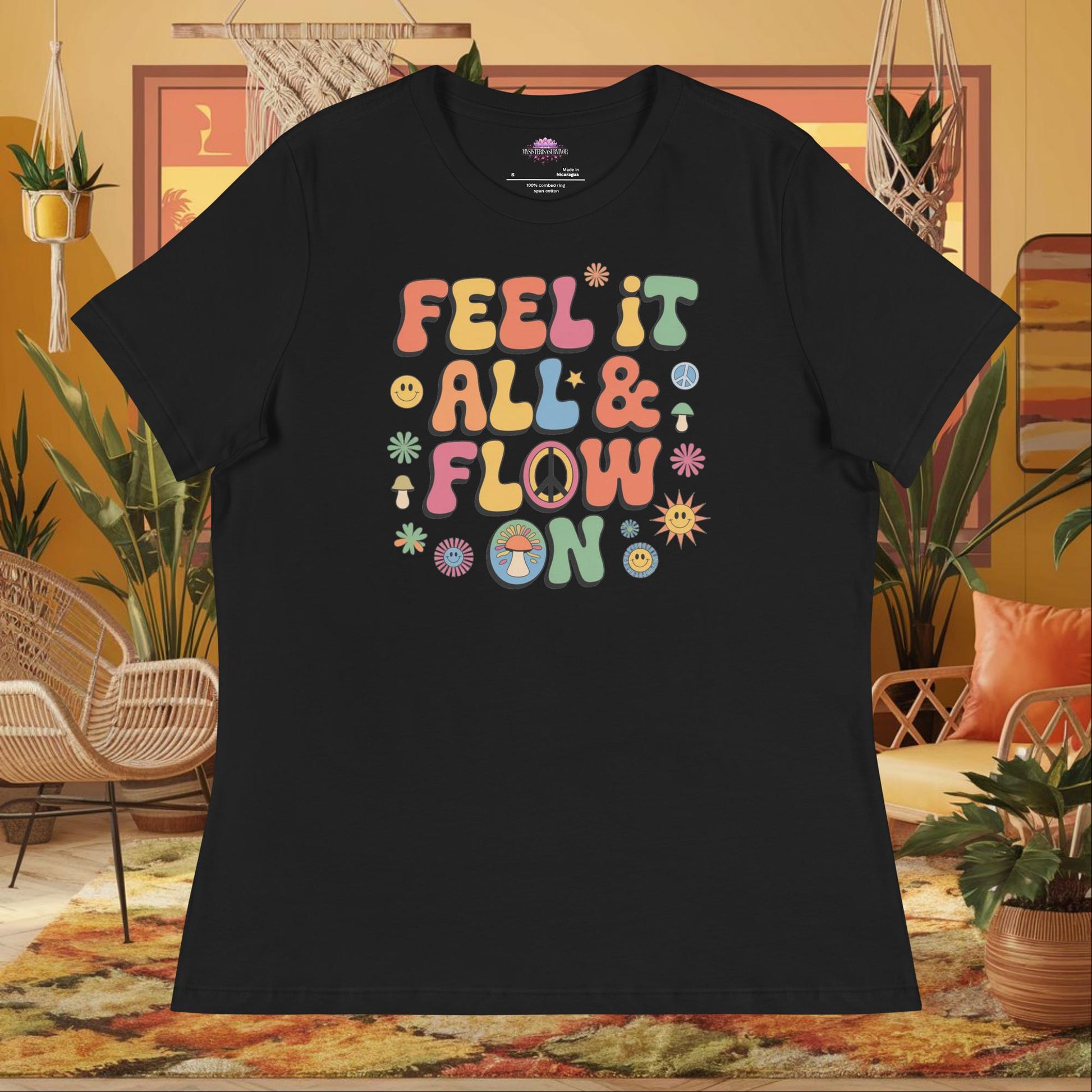 “Feel It All & Flow On” women’s relaxed fit tee showing an emotional healing mental health affirmation
