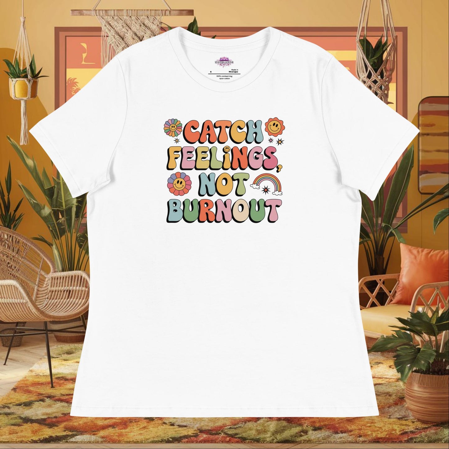 “Catch Feelings Not Burnout” women’s relaxed fit t-shirt featuring a mental health self-care affirmation design